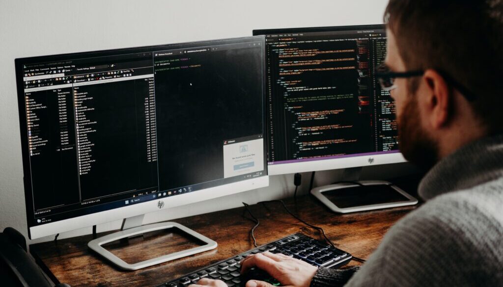 men working on computer